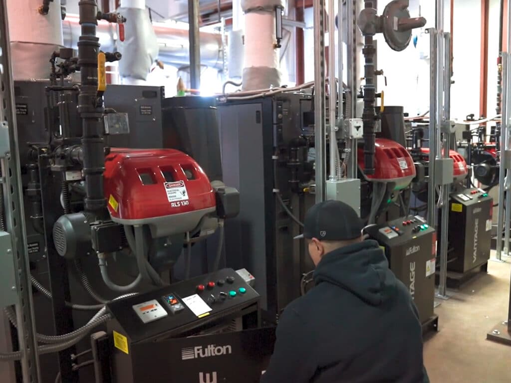 Man working on heating system