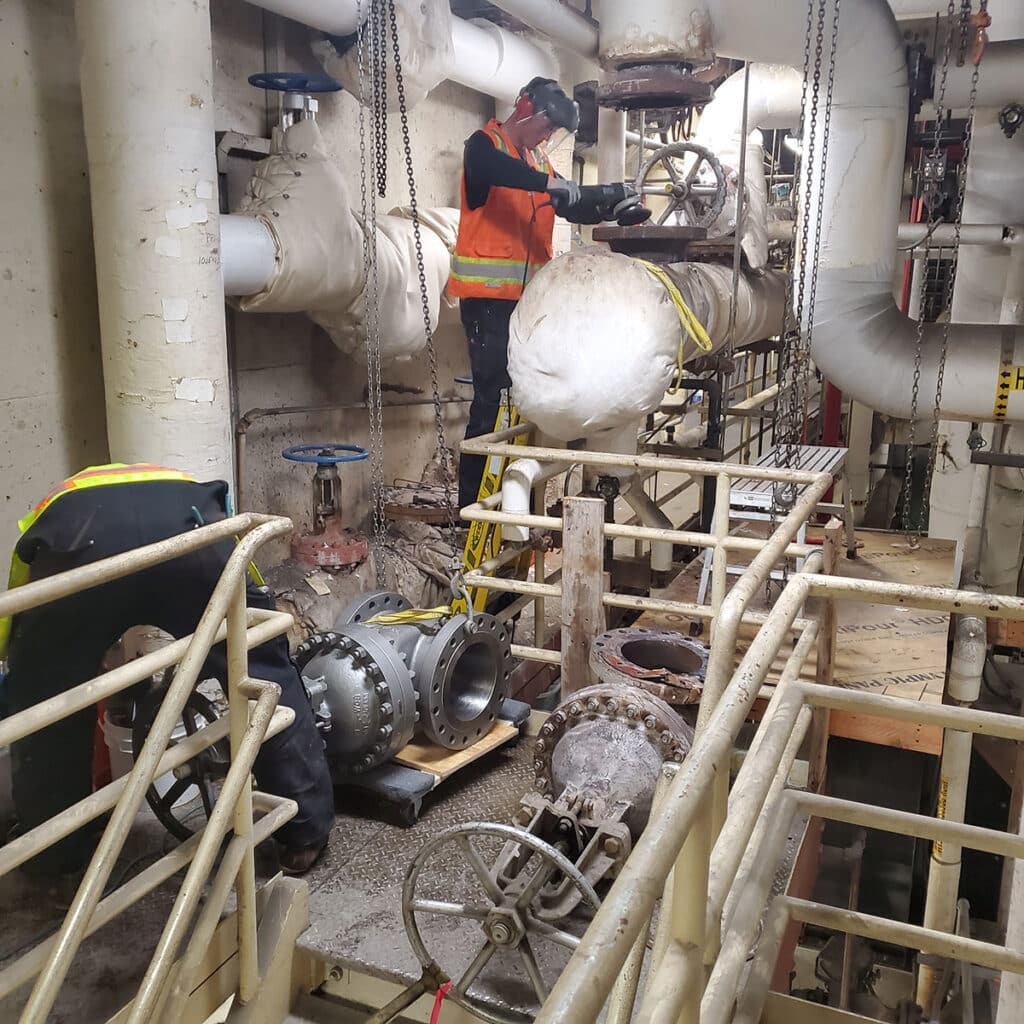 Man working on Ventilation system